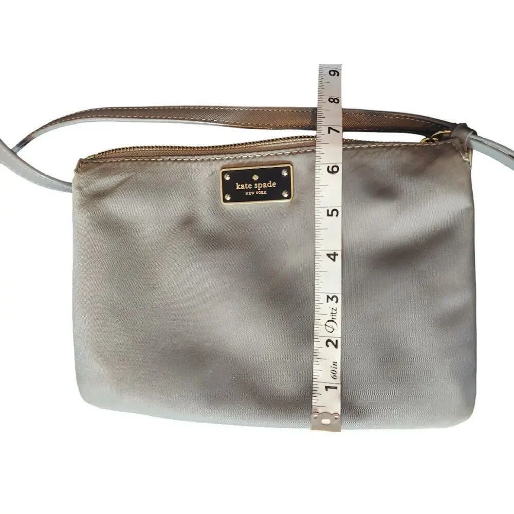 Kate Spade‎ New York gray nylon crossbody gold trim adjustable strap